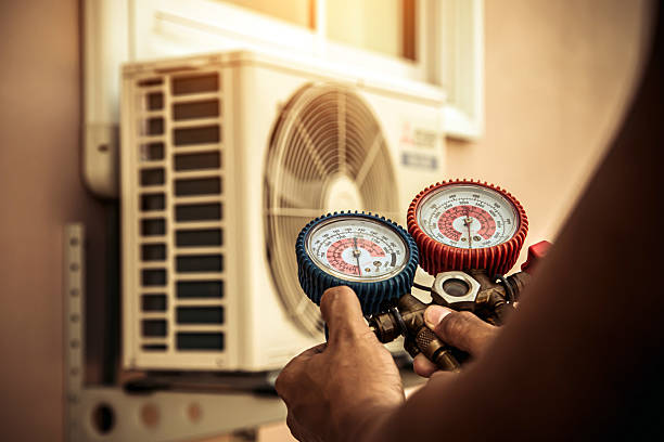 Professional Heat Pump Repair technician working in Bethel, NC